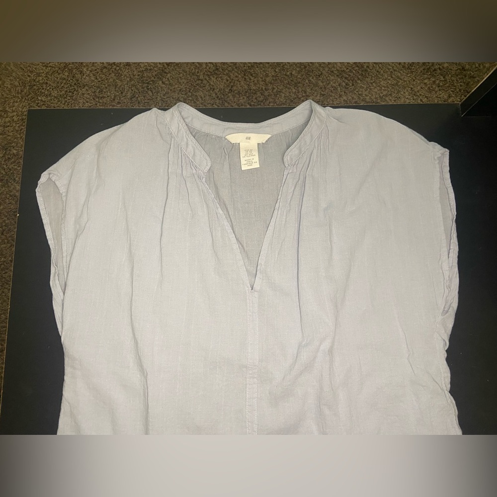 H&M light blue top in size XS.
